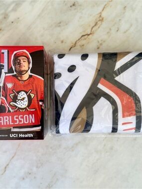 NHL Anaheim Ducks Blanket + Leo Carlsson Anaheim Ducks Figurine Bundle